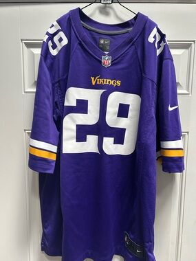 NFL Vikings jersey.